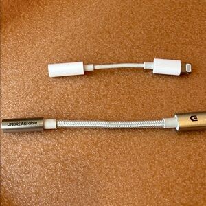 Apple headphone to lightning cable converters